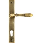From The Anvil Reeded Slimline Lever Espagnolette, Sprung Door Handles, Aged Brass - 33039 (sold in pairs)