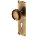 Heritage Brass Balmoral Low Profile Door Knobs On Backplate, Antique Brass - BAL8500-AT (sold in pairs)