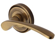 Heritage Brass Sophia Door Handles On Round Rose, Antique Brass - V1900-AT (sold in pairs)