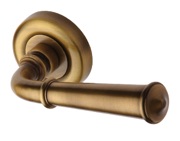 Heritage Brass Colonial Door Handles On Round Rose, Antique Brass - V1932-AT (sold in pairs)