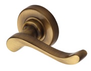 Heritage Brass Bedford Door Handles On Round Rose, Antique Brass - V3010-AT (sold in pairs)