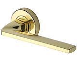 Heritage Brass Metro Angled Design Door Handles On Round Rose, Polished Brass - V3790-PB (sold in pairs)