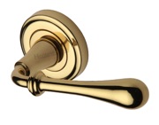 Heritage Brass Roma Door Handles On Round Rose, Polished Brass - V7155-PB (sold in pairs)