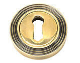 From The Anvil Standard Profile Beehive Round Escutcheon, Aged Brass - 45685