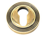 From The Anvil Euro Profile Beehive Round Escutcheon, Aged Brass - 45709