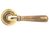 From The Anvil Hammered Newbury Door Handles On Plain Rose, Aged Brass - 46069 (sold in pairs)