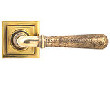 From The Anvil Hammered Newbury Door Handles On Square Rose, Aged Brass - 46072 (sold in pairs)