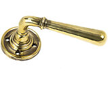 From The Anvil Newbury Door Handles On Round Rose, Aged Brass - 91418 (sold in pairs)