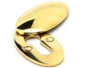 From The Anvil Standard Profile Oval Escutcheon & Cover, Polished Brass - 91987