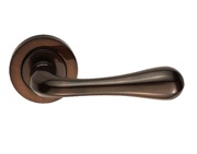 Carlisle Brass Manital Stella Door Handles On Round Rose, Dark Bronze - AQ1DB (sold in pairs)