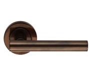 Carlisle Brass Manital Calla Door Handles On Round Rose, Dark Bronze - AQ4DB (sold in pairs)