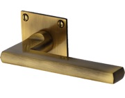 Heritage Brass Trident Low Profile Door Handles On Square Rose, Antique Brass - BAU2910-AT (sold in pairs)