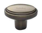 Heritage Brass Stepped Oval Cabinet Knob, Antique Brass - C3975-AT
