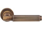 Carlisle Brass Varese Knurled Door Handles On Round Rose, Antique Brass - EUL050AB (sold in pairs)