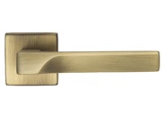 Carlisle Brass Manital Flash Door Handles On Square Rose, Antique Brass - FH5AB (sold in pairs)