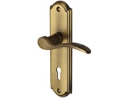 Heritage Brass Howard Antique Brass Door Handles - HOW1300-AT (sold in pairs)