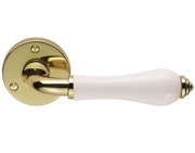 Carlisle Brass Porcelain Door Handles On Round Rose, Plain White On Polished Brass Rose - PLW (sold in pairs)