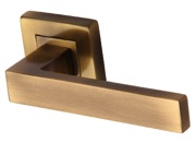 Heritage Brass Delta SQ Door Handles On Square Rose, Antique Brass - SQ5420-AT (sold in pairs)