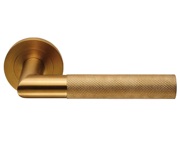 Eurospec Steelworx Crown Knurled Door Handles On Round Rose, Satin PVD Brass - SWL1169SPVD (sold in pairs)