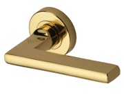 Heritage Brass Trident Door Handles On Round Rose, Polished Brass - TRI1352-PB (sold in pairs)