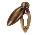 Heritage Brass Covered Oval Standard Key Escutcheon, Antique Brass - V1022-AT