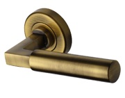 Heritage Brass Bauhaus Door Handles On Round Rose,Antique Brass - V2259-AT (sold in pairs)