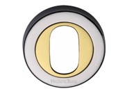 Heritage Brass Oval Profile Key Escutcheon Dual Finish, Polished Chrome With Polished Brass - V4010-CB