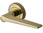 Heritage Brass Gio Door Handles On Round Rose, Polished Brass - V4189-PB (sold in pairs)