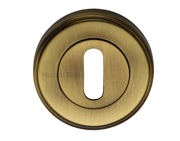 Heritage Brass Standard Key Escutcheon, Antique Brass - V5000-AT