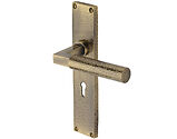 Heritage Brass Bauhaus Hammered Door Handles On 200mm Backplate, Antique Brass - VTH4300-AT (sold in pairs)